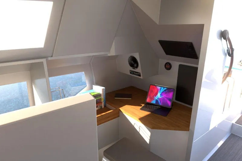 Slide: The Image of Modern interior of 2026 Catamaran Dual Flyer 400 with workspace and laptop. - 28