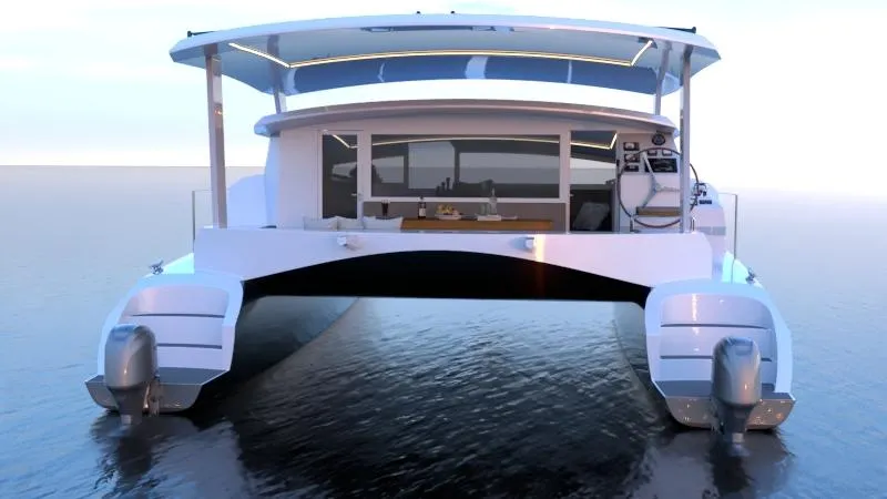 Slide: The Image of 2025 Catamaran Dual Flyer 400 on calm water, rear view. - 8