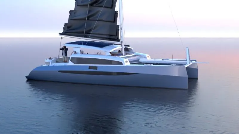 Slide: The Image of 2025 Catamaran Dual Flyer 400 sailing on calm waters at sunset. - 3