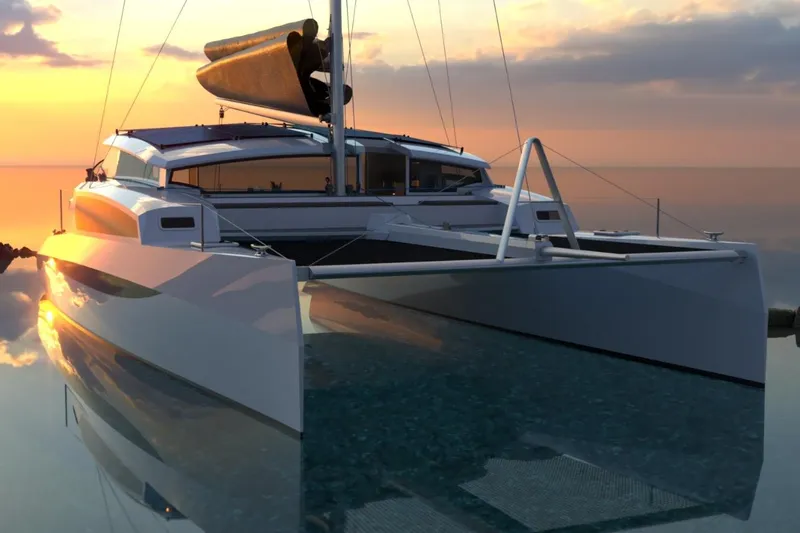 Slide: The Image of Futuristic 2026 Catamaran Dual Flyer 400 sailing at sunset on calm waters. - 6
