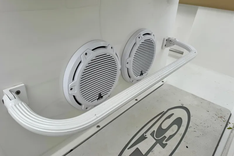 Slide: The Image of 2016 Sea Hunt Ultra 234 boat speakers and grab rail detail. - 14