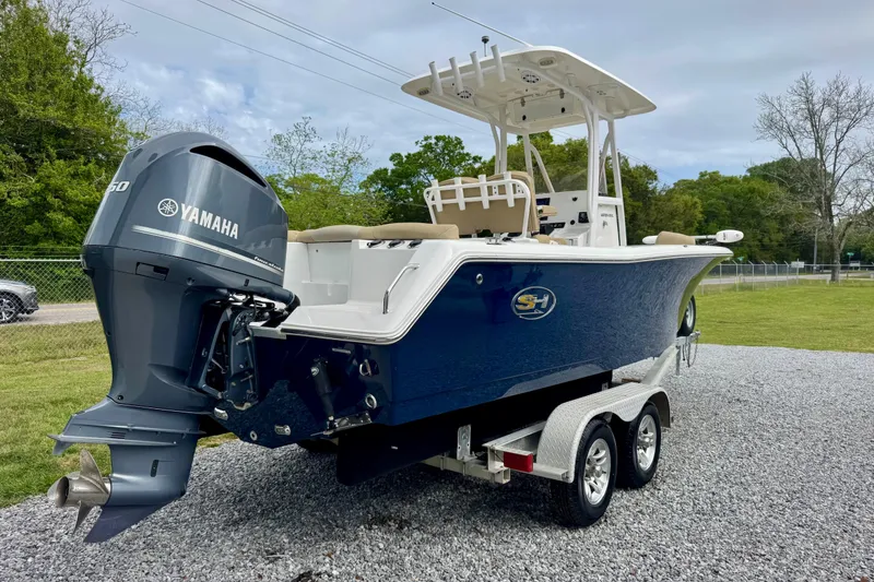 Slide: The Image of 2016 Sea Hunt Ultra 234 boat with Yamaha engine on trailer. - 3