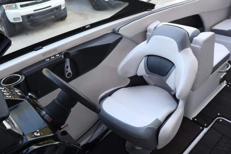 Slide: The Image of Interior of 2023 Scarab 255 ID with modern helm. - 5