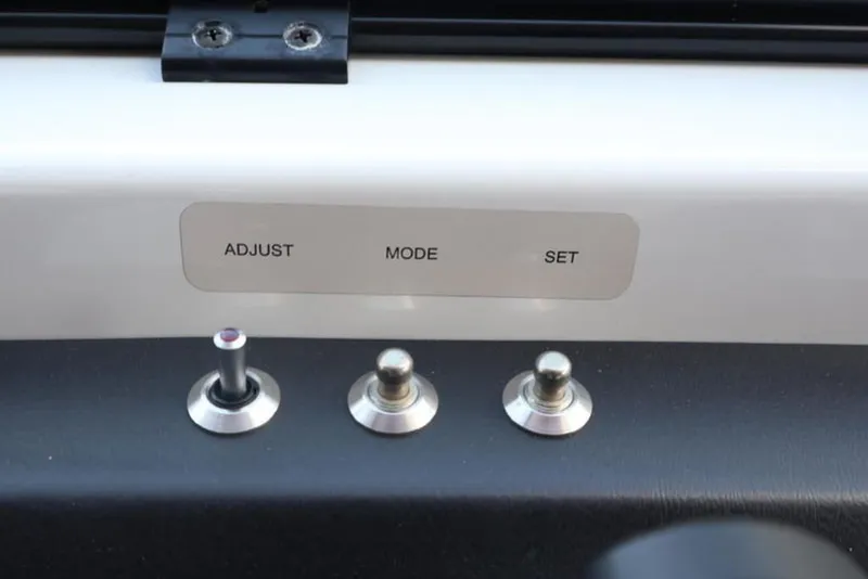 Slide: The Image of Control panel of 2023 Scarab 255 ID with labeled switches. - 7