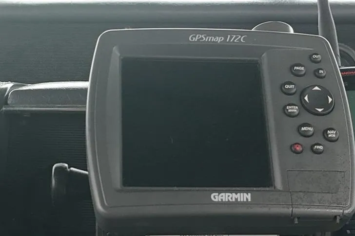 Slide: The Image of Garmin GPSmap 172C on 1993 Sea Ray 290 Sundancer dashboard. - 35