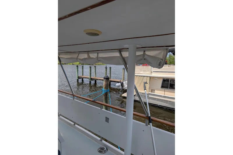 Slide: The Image of 1987 Tayana 45 Expedition Trawler docked, view from deck with water and pier. - 26