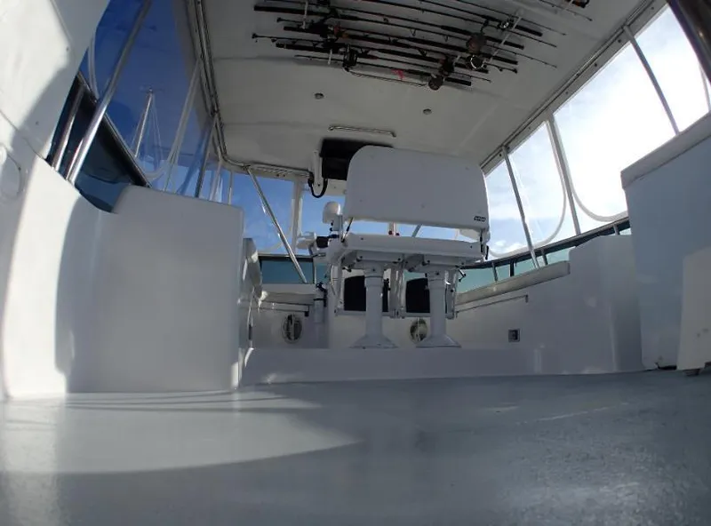 Slide: The Image of Interior view of 1987 Tayana 45 Expedition Trawler with fishing rods on ceiling. - 7