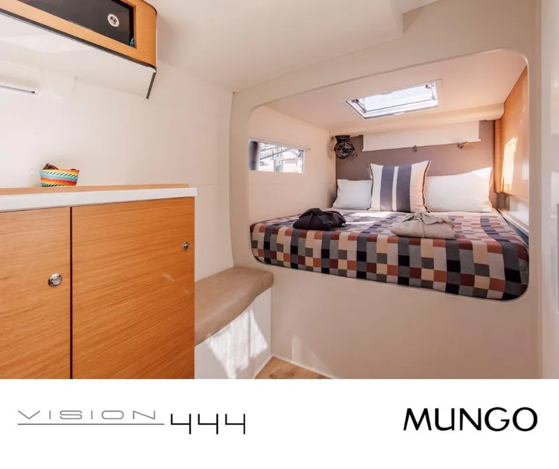 Slide: The Image of Cozy cabin interior of Vision 444 yacht, featuring a comfortable bed and modern design. - 25