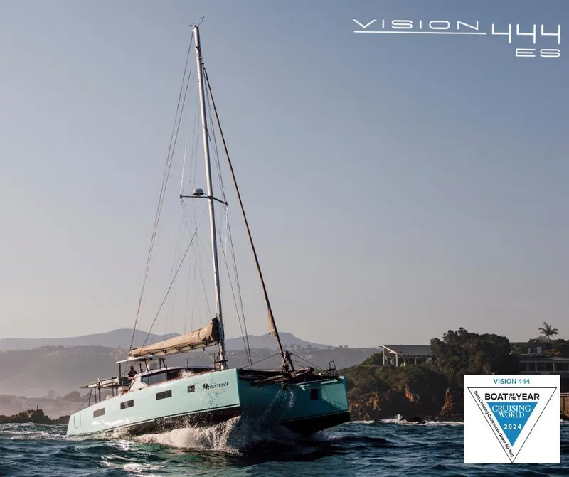 Slide: The Image of Sailing yacht Vision 444 cruising near rocky coastline, 2026 model, awarded Boat of the Year 2024. - 3