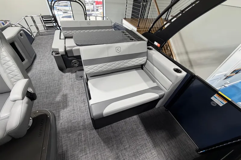 Slide: The Image of Luxurious seating on 2026 Godfrey Monaco 255 MTF pontoon boat interior. - 11
