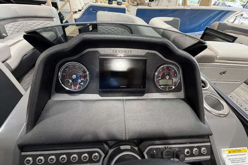 Slide: The Image of Dashboard of 2026 Godfrey Monaco 255 MTF boat with modern controls and display. - 8