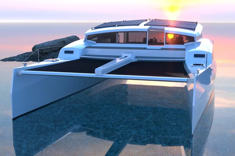 Slide: The Image of 2026 Catamaran Cruisers Power Cat at sunset on calm waters. - 3