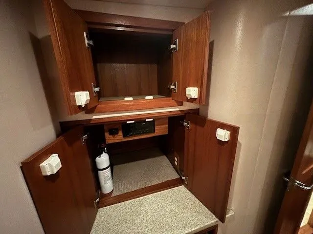 Slide: The Image of Interior of 2007 Albemarle 36 Express Fisherman with wooden cabinets. - 11