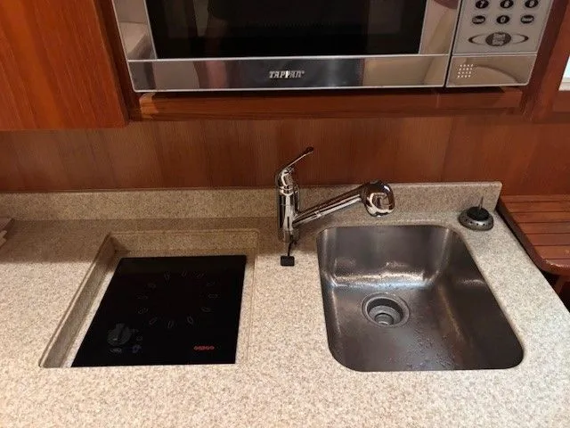 Slide: The Image of Galley in 2007 Albemarle 36 Express Fisherman with sink and stove. - 13