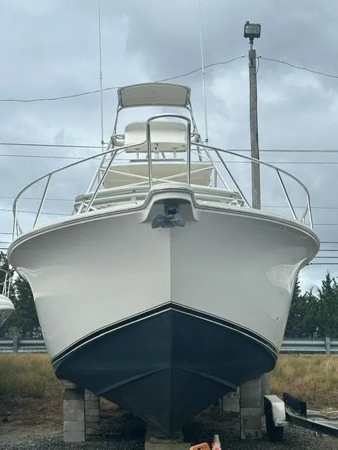 Slide: The Image of 2007 Albemarle 36 Express Fisherman boat on blocks, front view. - 2