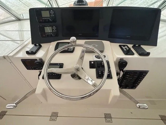 Slide: The Image of Helm of 2007 Albemarle 36 Express Fisherman with navigation equipment. - 20