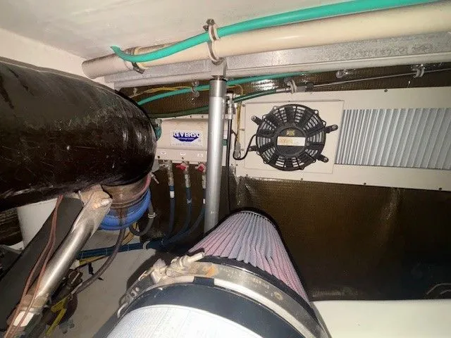 Slide: The Image of Engine room of 2007 Albemarle 36 Express Fisherman with fan and hoses. - 30