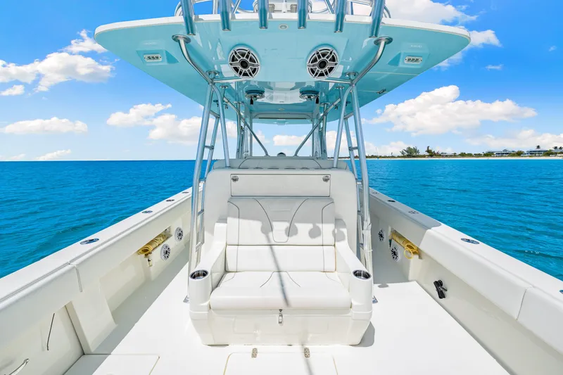 Slide: The Image of 2021 SeaVee 390B boat interior with seating, ocean view, and clear blue sky. - 38