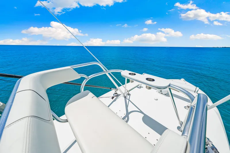 Slide: The Image of 2021 SeaVee 390B boat deck overlooking the ocean under a clear blue sky. - 51