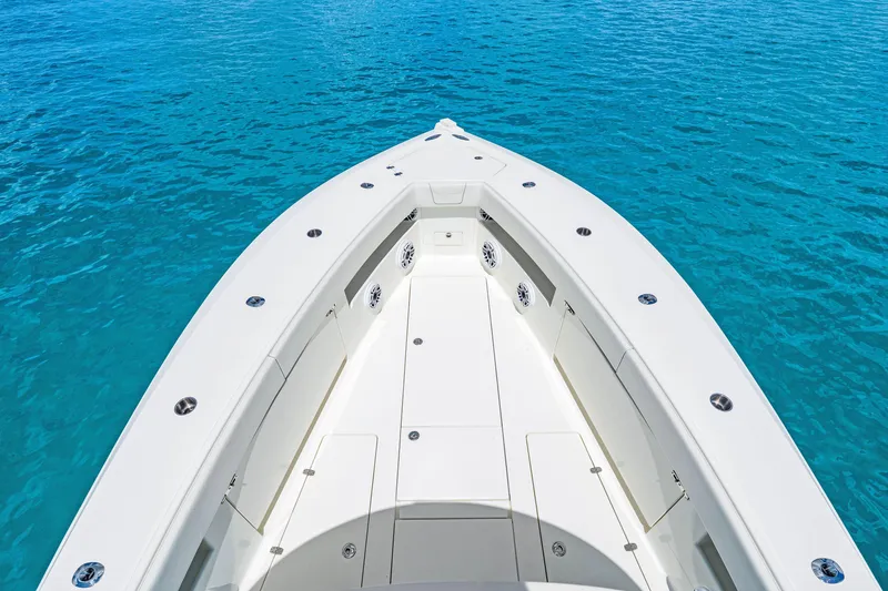 Slide: The Image of Bow view of 2021 SeaVee 390B boat on clear blue water. - 52