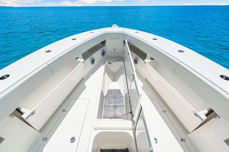 Slide: The Image of 2021 SeaVee 390B boat interior with open storage, surrounded by blue ocean. - 66