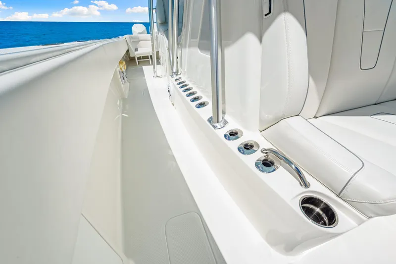 Slide: The Image of 2021 SeaVee 390B boat interior with white seating and ocean view. - 69