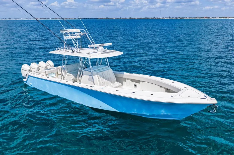 Slide: The Image of 2021 SeaVee 390B boat on clear blue ocean water. - 7