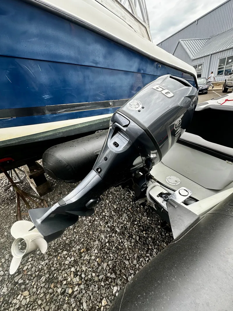 Slide: The Image of Zodiac Open 4.8 boat with outboard motor, year 2023. - 7