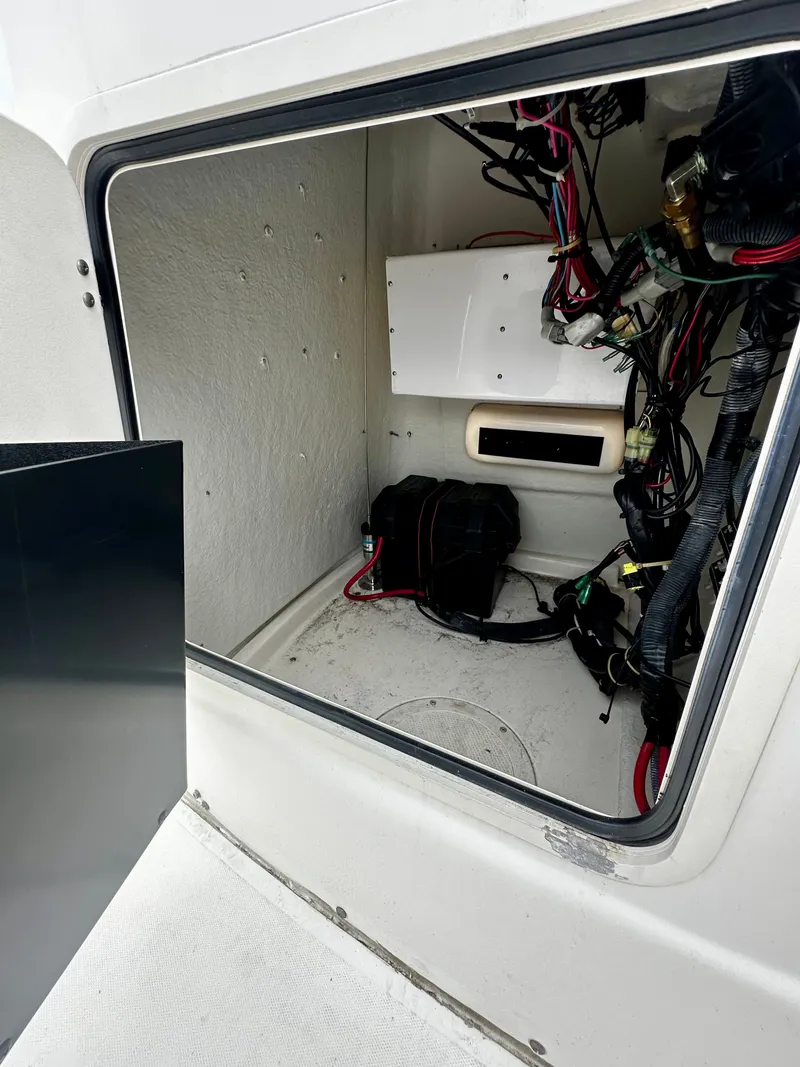 Slide: The Image of Interior of a 2004 Boston Whaler 190 Nantucket boat, showing wiring. - 11