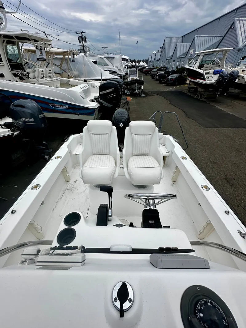 Slide: The Image of 2004 Boston Whaler 190 Nantucket boat in harbor, interior view. - 14