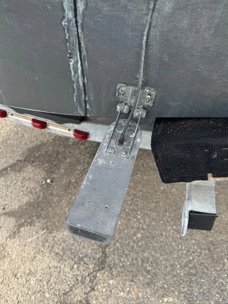 Slide: The Image of Trim tab of a 2004 Boston Whaler 190 Nantucket boat. - 17