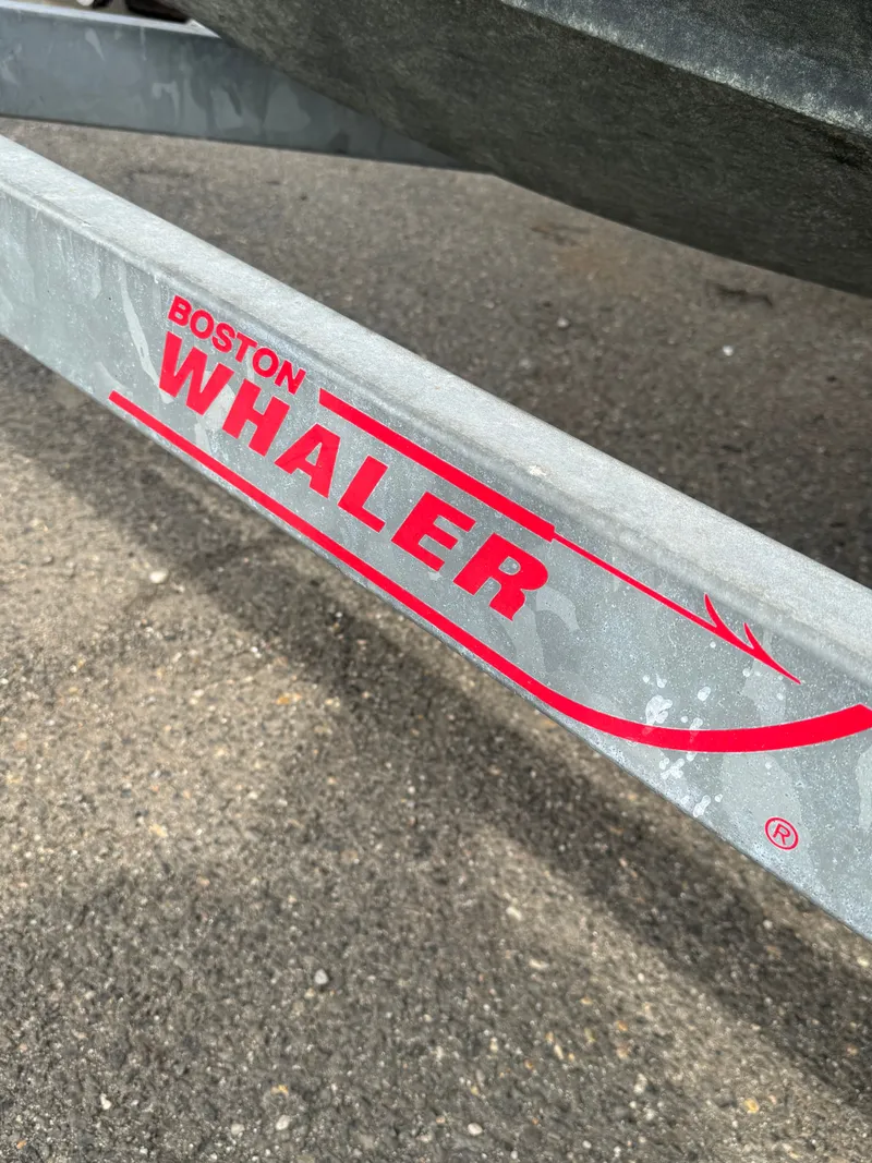 Slide: The Image of Close-up of Boston Whaler 190 Nantucket 2004 boat trailer. - 19