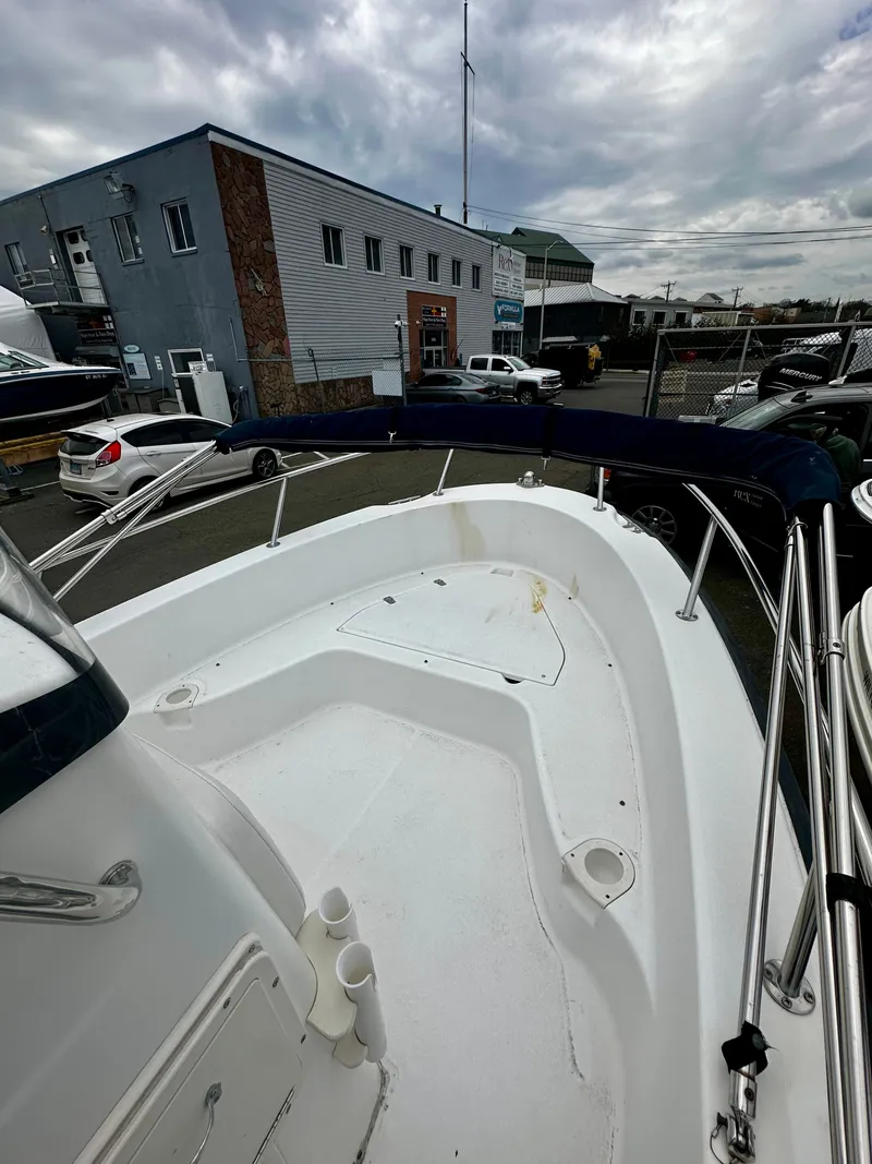 Slide: The Image of 2004 Boston Whaler 190 Nantucket boat deck and canopy view. - 5