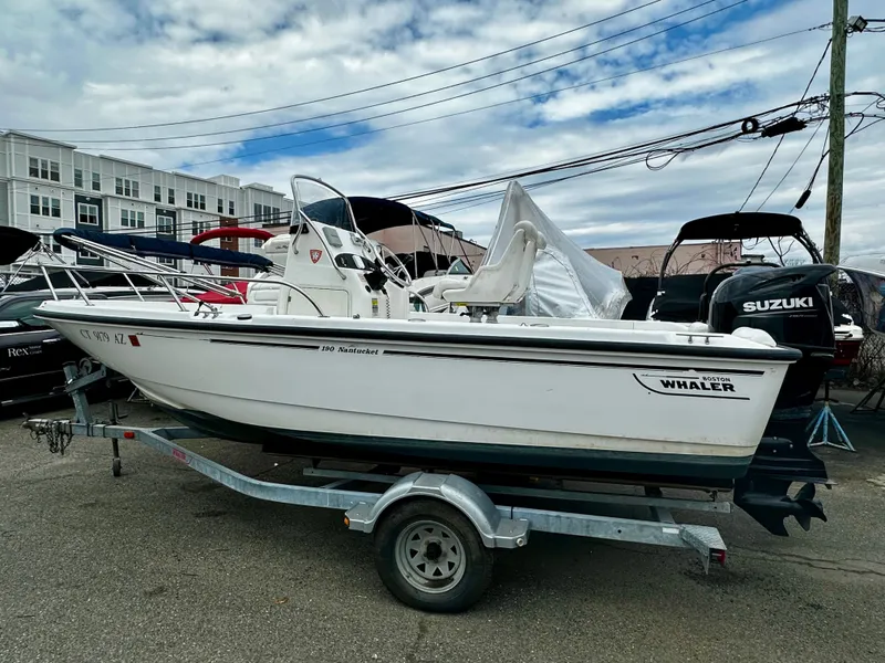Slide: The Image of 2004 Boston Whaler 190 Nantucket boat on trailer, Suzuki engine. - 7