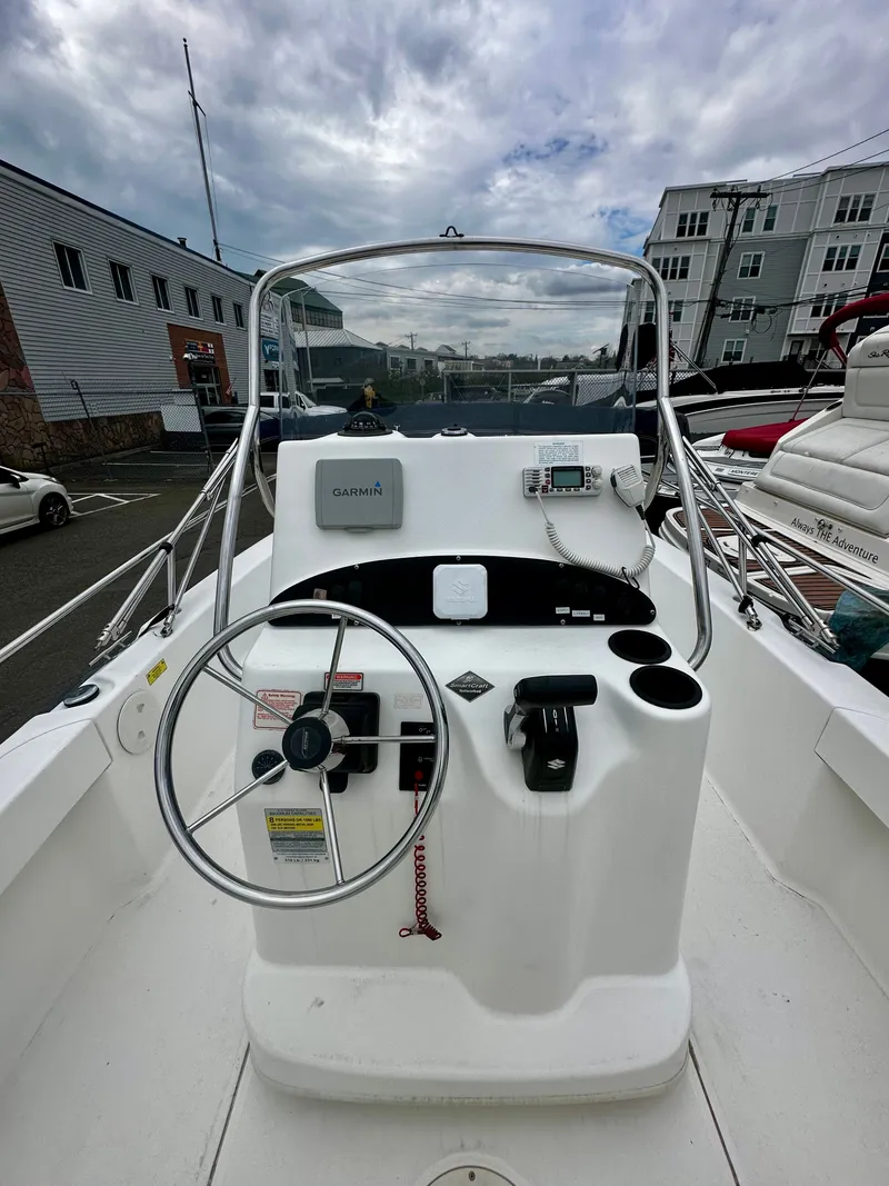 Slide: The Image of 2004 Boston Whaler 190 Nantucket boat console with Garmin device. - 9