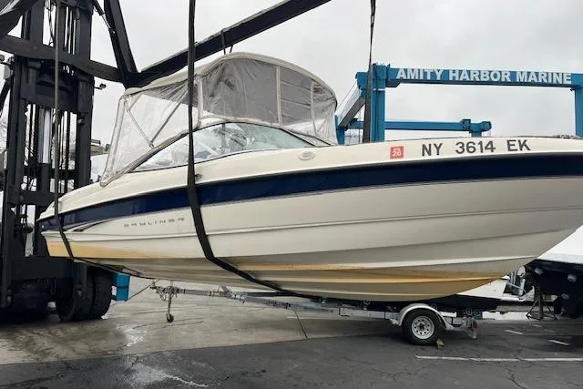 Slide: The Image of 2003 Bayliner 205 Classic boat being lifted at Amity Harbor Marine. - 15