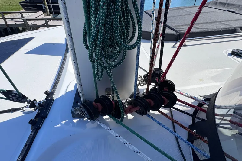 Slide: The Image of Close-up of rigging and ropes on a 2018 Lagoon 42 catamaran deck. - 15