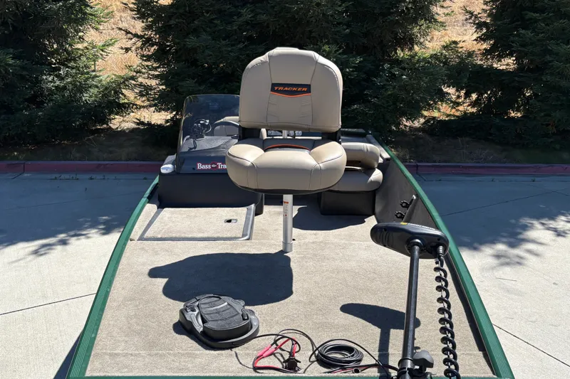 Slide: The Image of 2026 Tracker Bass Tracker Classic Limited boat with seating and fishing equipment. - 15