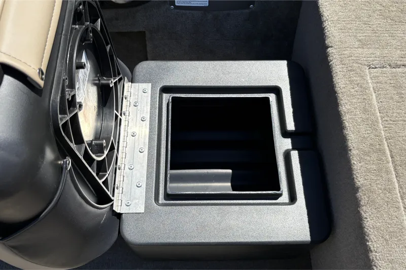 Slide: The Image of Open storage compartment in 2026 Tracker Bass Tracker Classic Limited boat. - 27