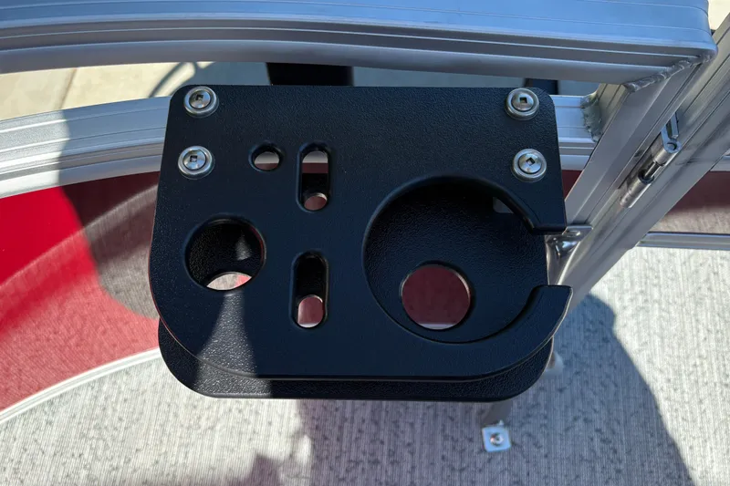 Slide: The Image of Close-up of a 2026 Sun Tracker Bass Buggy 16 XL Select cup holder on a boat railing. - 25