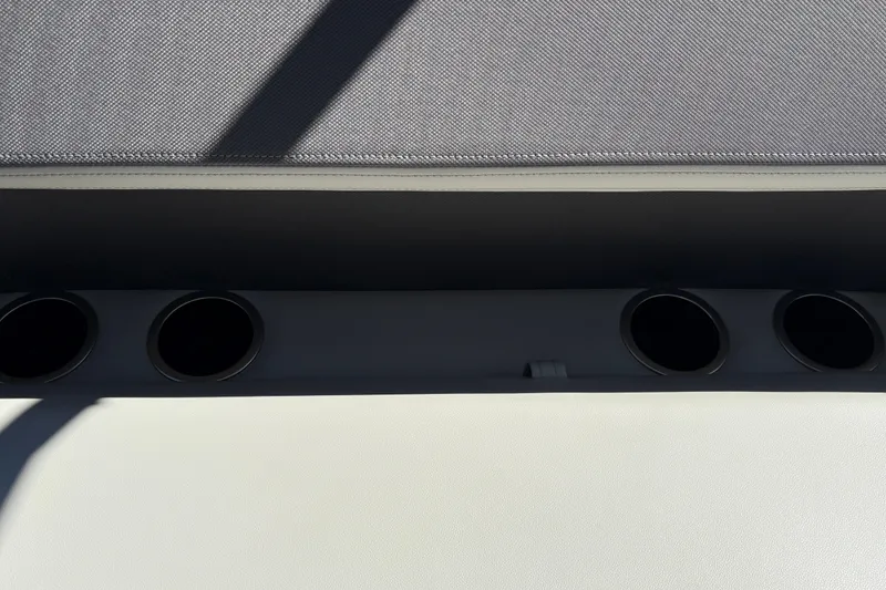 Slide: The Image of Interior cup holders of 2026 Sun Tracker Bass Buggy 16 XL Select boat. - 39
