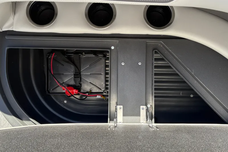 Slide: The Image of Battery compartment of 2026 Sun Tracker Bass Buggy 16 XL Select boat, featuring secure wiring. - 30