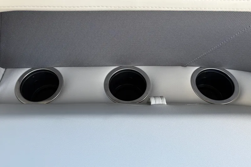 Slide: The Image of Three cup holders on Sun Tracker Bass Buggy 16 XL Select, 2026 model. - 33