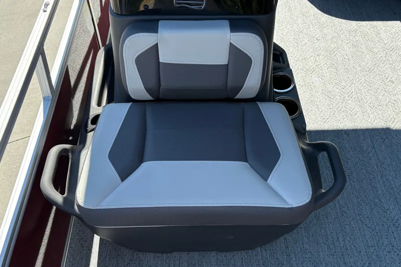 Slide: The Image of 2026 Sun Tracker Bass Buggy 16 XL Select boat seat with cup holders and armrests. - 34