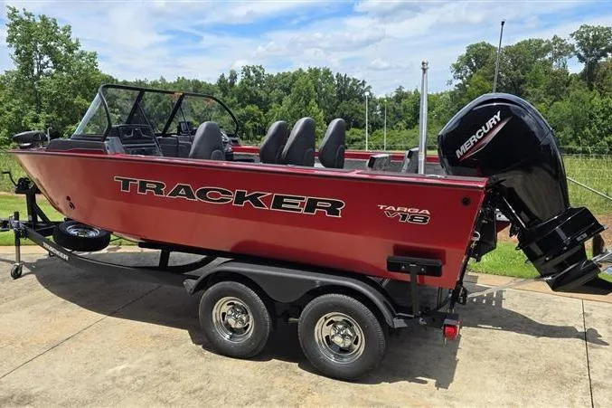 Slide: The Image of 2026 Tracker Targa V-18 Combo boat on trailer, red exterior, Mercury outboard motor. - 4