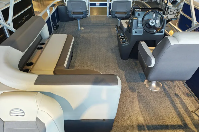 Slide: The Image of Interior of 2026 Sun Tracker Bass Buggy 18 DLX pontoon boat with seating and steering console. - 15