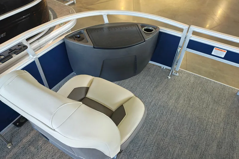 Slide: The Image of 2026 Sun Tracker Bass Buggy 18 DLX interior with seating and console details. - 20