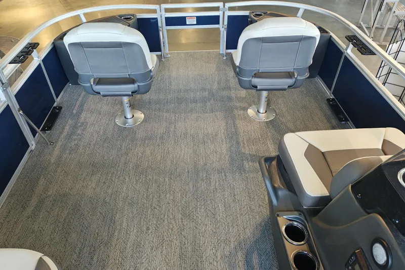 Slide: The Image of Interior of 2026 Sun Tracker Bass Buggy 18 DLX pontoon boat with seating and console. - 19