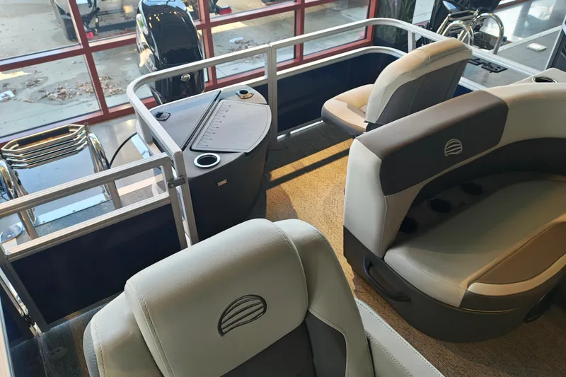 Slide: The Image of Interior of 2026 Sun Tracker Bass Buggy 18 DLX pontoon boat with seating and console. - 9