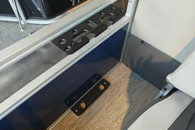 Slide: The Image of Interior view of 2026 Sun Tracker Bass Buggy 18 DLX boat with seating and flooring. - 13